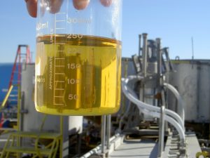 biodiesel plant w ethanol in beaker symbolizing the ethanol market outlook is cautiously optimistic