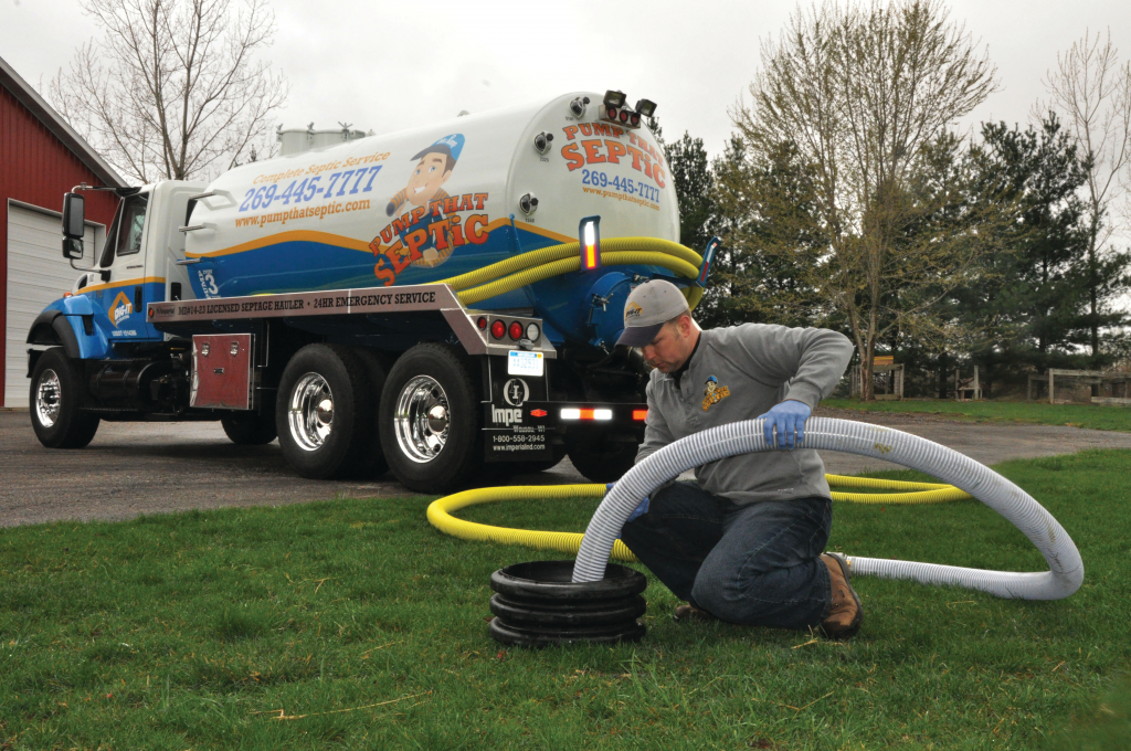 Pump that Septic, pumps out a septic tank using an International 7400 with a 3,200 gallon tank purchased from Imperial Industries