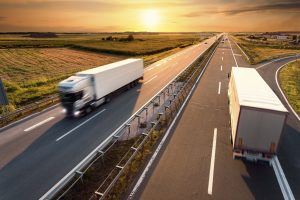 Trucks zooming on highway, Drivers Prefer Smaller Firms