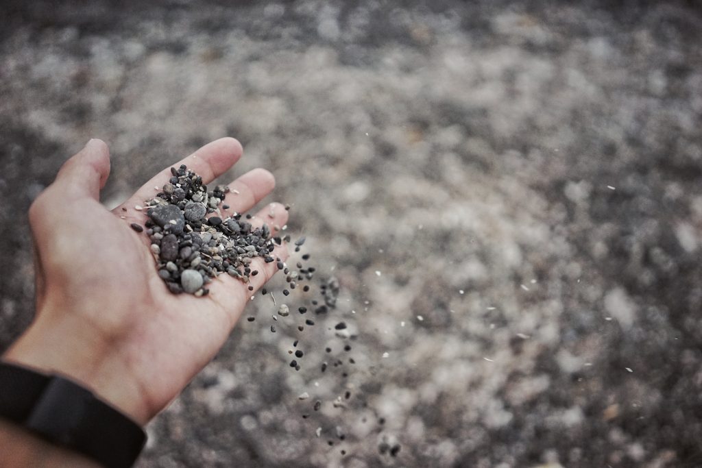 Gravel in hands, gravel, aggregate, grey gravel