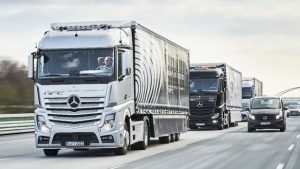 Daimler Autonomous Truck Platoon driving in formation on a highway