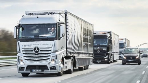 Daimler Autonomous Truck Platoon driving next to cars