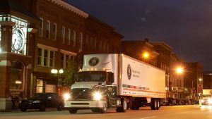 Old Dominion Freight Line Truck at night next to old brick building