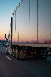 Aging Drivers Threaten Trucking Workforce, Sunset on Semi Truck - Photo by Caleb Ruiter on Unsplash