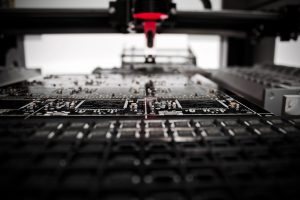 A close up of the production facility at the Bristol Robotics Laboratory - Photo by Louis Reed on Unsplash, Semi-conductor Shortages Slow Truck Production