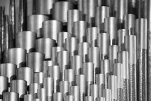 Photo by Rafik Wahba on Unsplash, Stainless steel imports rising as the S&P Global US Manufacturing PMI fell from 57 in May to 52.7 in June -- indicating a significant slowdown in the rate of expansion.