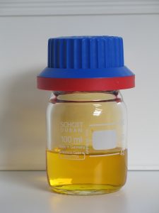 Fuming nitric acid contaminated with yellow nitrogen dioxide